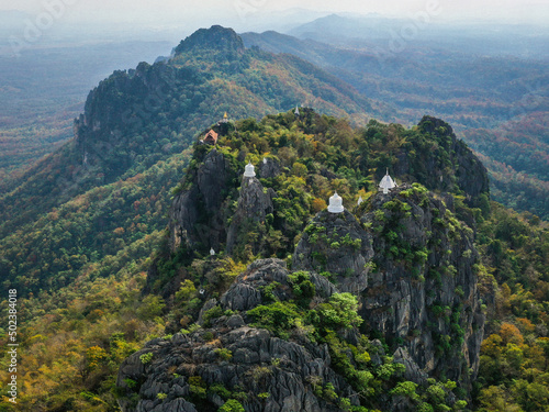 Aerial view of Wat Chaloem Phra Kiat Phrachomklao Rachanusorn, sky pagodas on top of mountain in Lampang Thailand photo