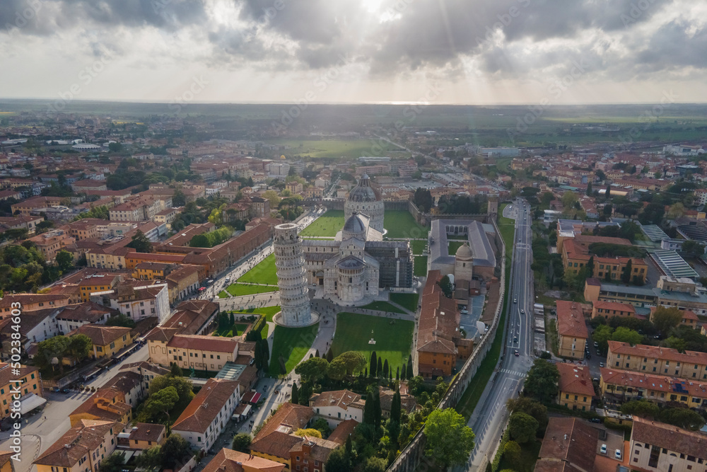 Pisa, Tuscany - 25 April 2022: Aerial view of Pisa leaning tower with the cathedral in Pisa, Tuscany, Italy. Pisa, Tuscany - 25 April 2022: Aerial view of Pisa leaning tower with the cathedral in Pisa, Tuscany, Italy.