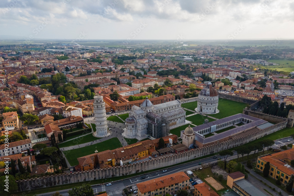 Pisa, Tuscany - 25 April 2022: Aerial view of Pisa leaning tower with the cathedral in Pisa, Tuscany, Italy. Pisa, Tuscany - 25 April 2022: Aerial view of Pisa leaning tower with the cathedral in Pisa, Tuscany, Italy.