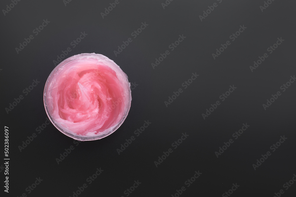 Rose body oil on dark background Rose body oil on dark background