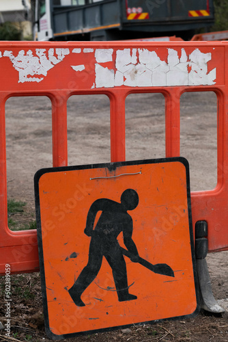 Orange-black construction sign