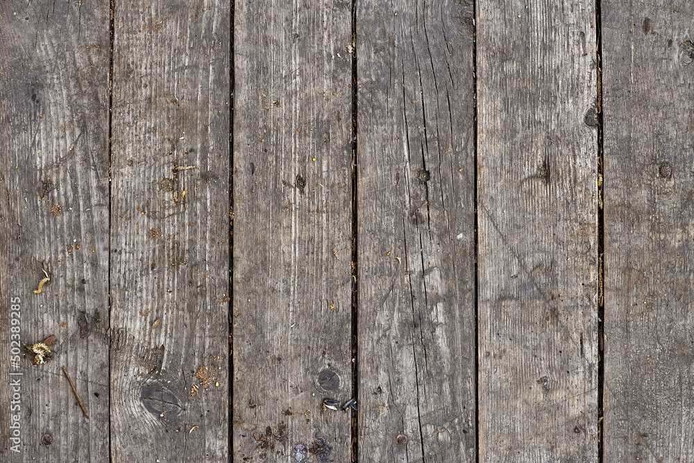 Closeup photo of old gray wooden wall texture background Closeup photo of old gray wooden wall texture background