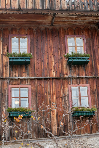 Verticalshot of a house in Hallstatt village in mountainous Salzkammergut region, Austria photo