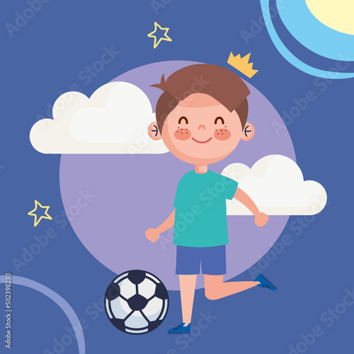 little boy playing soccer