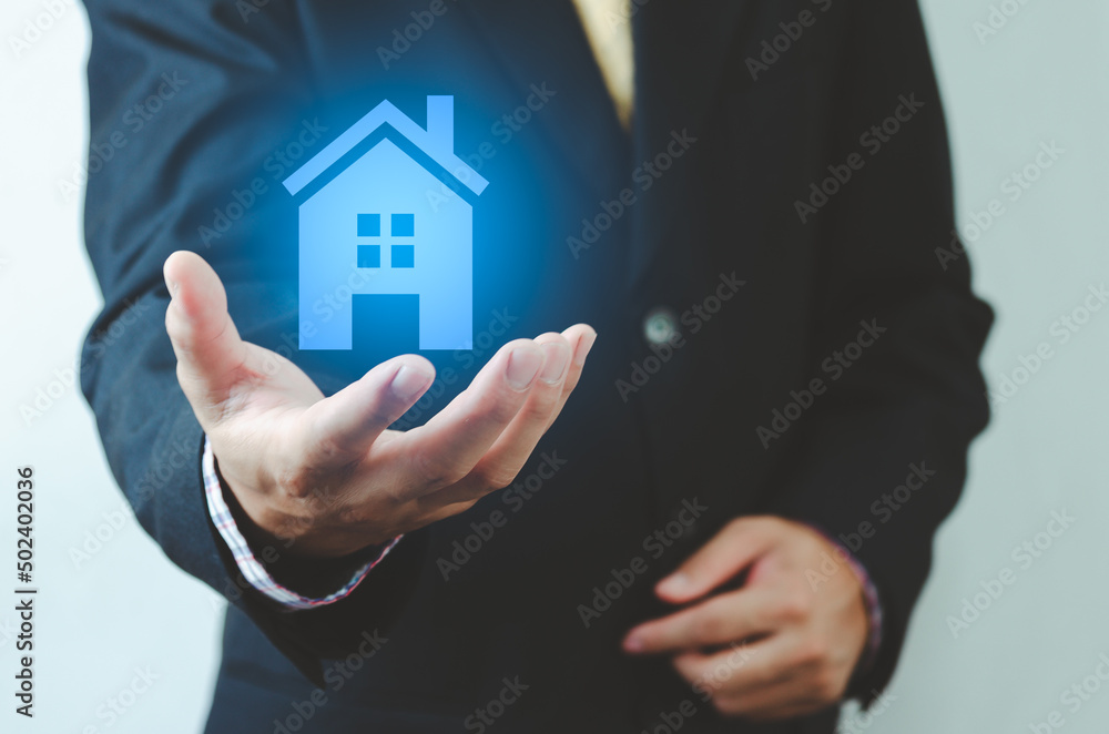 real estate ideas house trading Businessman holding house icon. House on hand. Insurance and safety concept. Symbol of house.. real estate ideas house trading Businessman holding house icon. House on hand. Insurance and safety concept. Symbol of house..