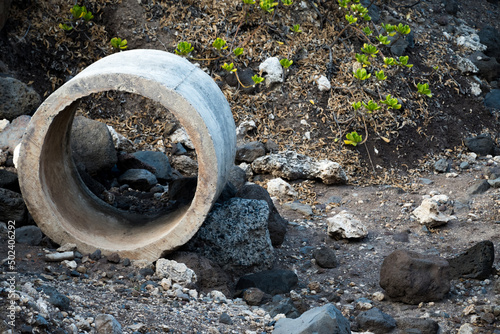 Closeup shot of a drainage pipe section, Kaena point, Hawaii photo