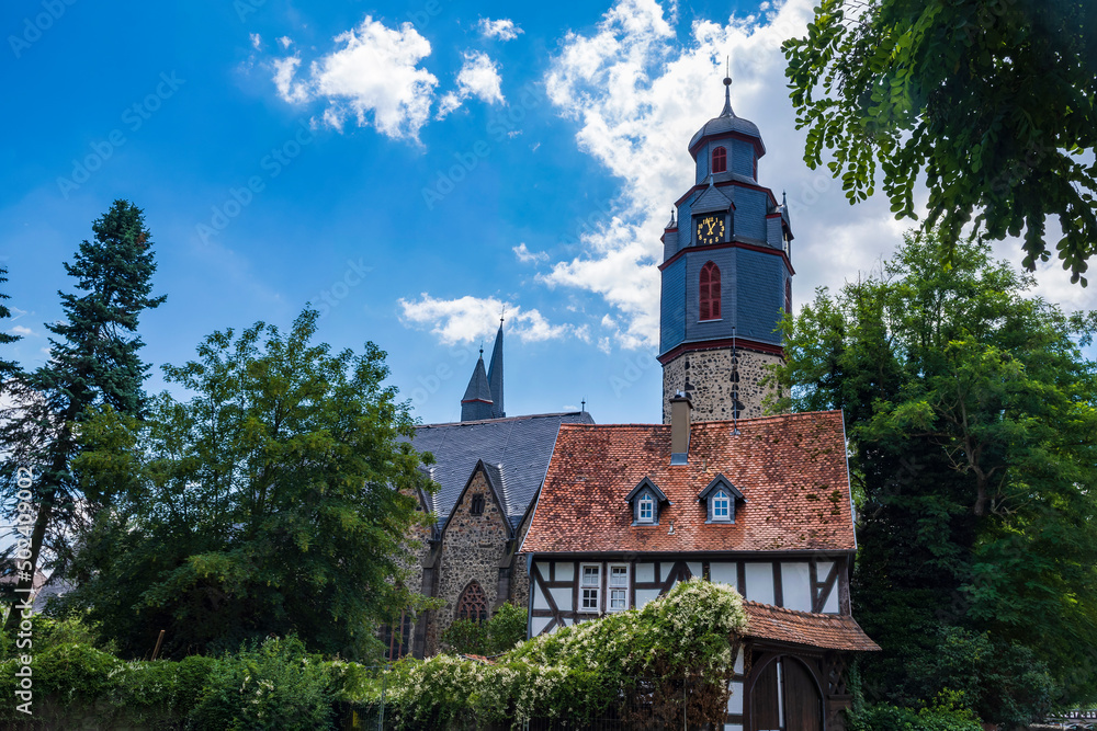 View of the church tower of St. Mark's Church in the old town of Butzbach/Germany in Hesse View of the church tower of St. Mark's Church in the old town of Butzbach/Germany in Hesse