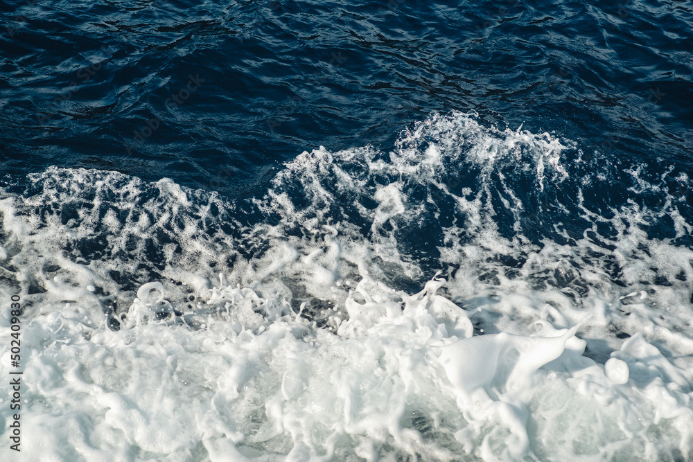 Fototapeta premium Crashing waves foam in the mediterranean sea