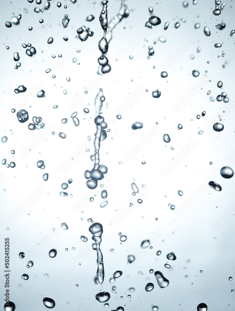 Falling drops of water in counter light Falling drops of water in counter light