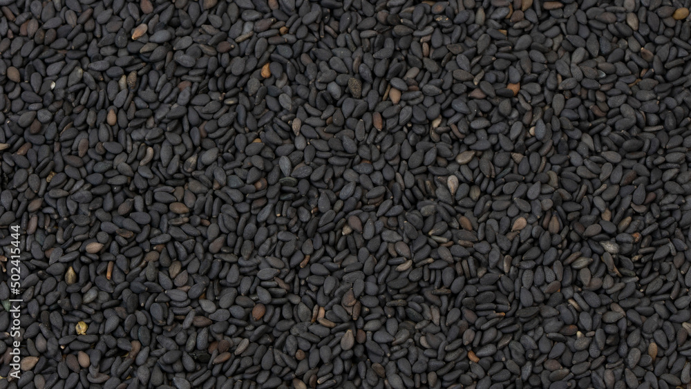 Black sesame seeds close up background Black sesame seeds close up background