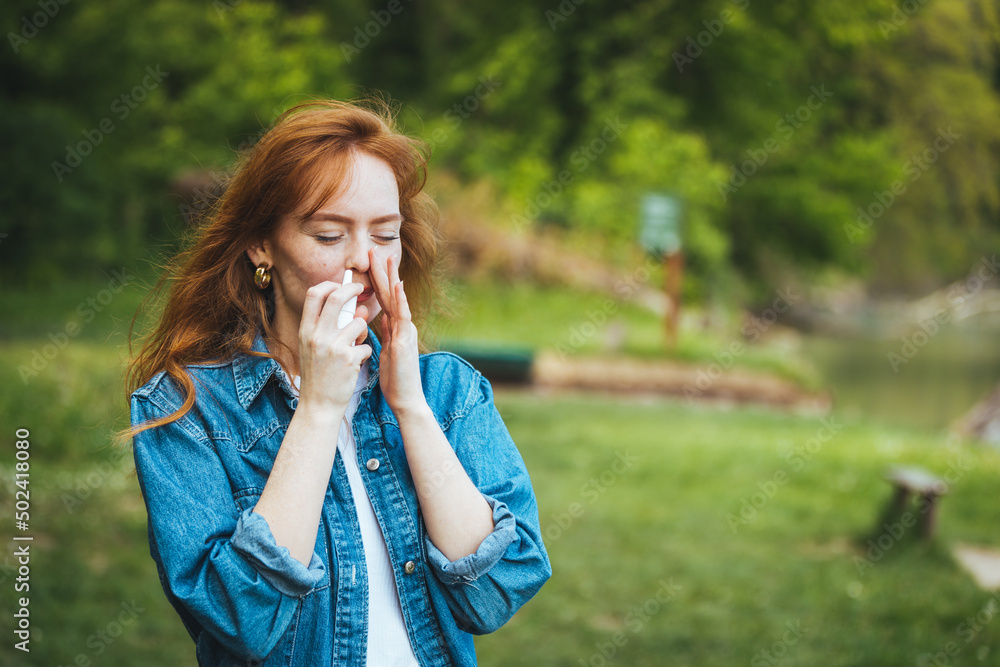 Woman Is Having Flu And She Is Using Nasal Spray To Help Herself Woman