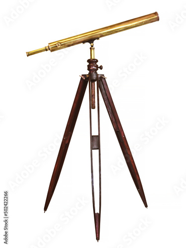 Foto Authentic ancient telescope with wooden tripod isolated on a white background