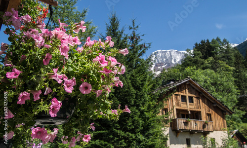 Serene landscape of rural houses on a mountain in Bionnassay, France photo