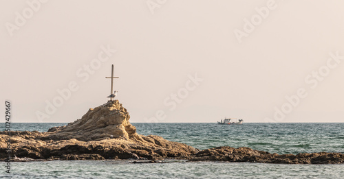 Cross on Agean Sea with Ferry photo