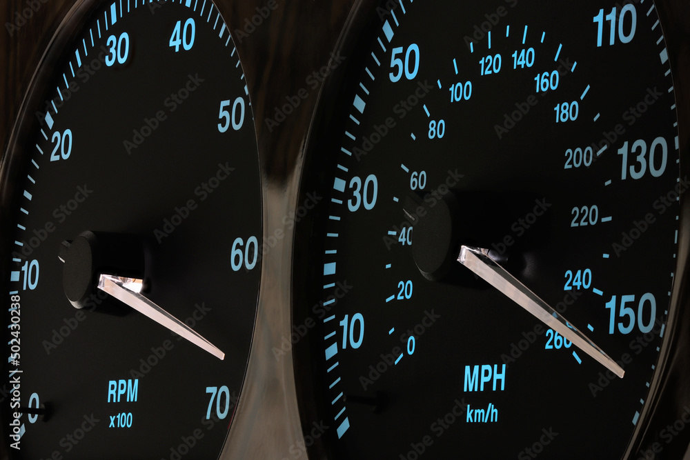 tachometer and speedometer in car dashboard at full power in illuminated night mode tachometer and speedometer in car dashboard at full power in illuminated night mode