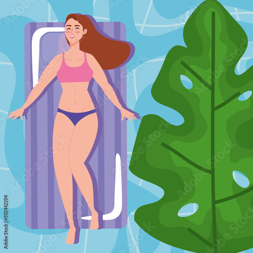 woman tanning in mat inflatable