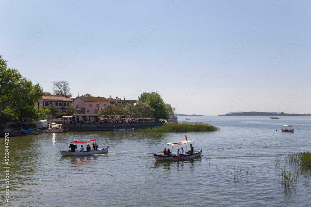 Boats cruising on the lake bursa golyazi, turkey