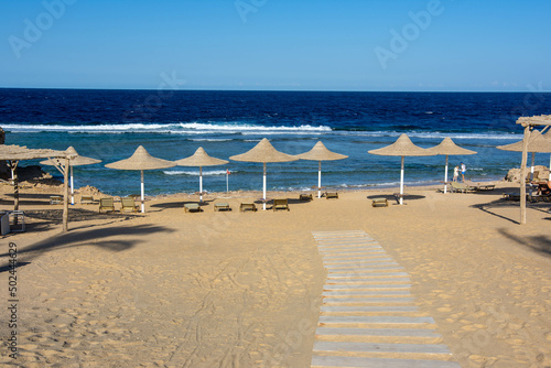 beach with umbrellas