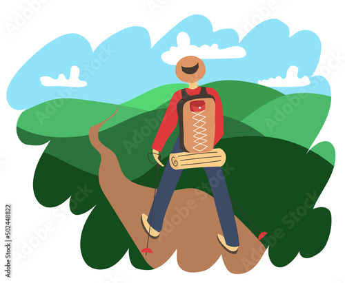 traveler with a backpack on a hike among the hills