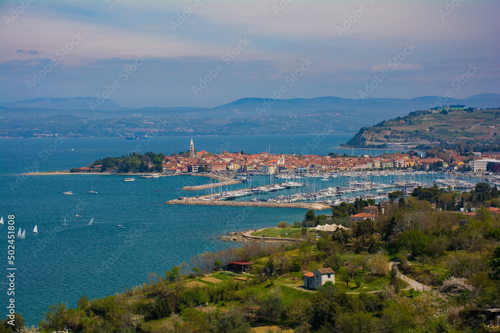 The historic town of Izola on the Adriatic coast of Slovenia. Trieste in Italy is in the background
