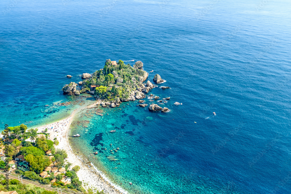Isola Bella seen from above in the turquoise blue sea on the island of Sicily