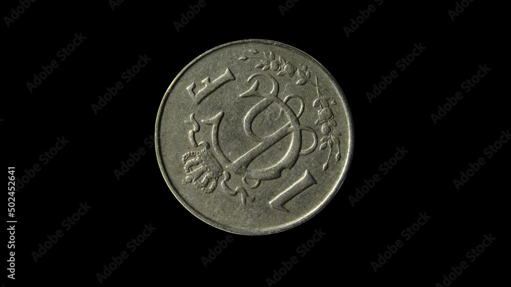 Reverse of Luxembourg coin 1 franc 1953 isolated in black background. Close up view. Reverse of Luxembourg coin 1 franc 1953 isolated in black background. Close up view.