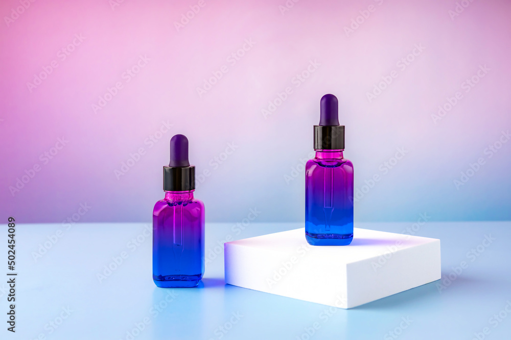 cosmetic containers on the catwalk on a color gradient background cosmetic containers on the catwalk on a color gradient background