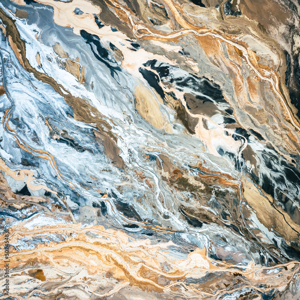Obraz premium Industrial Landscape. Aerial view. Dry surface. Desertic landscape. Human impact on the environment. View from above. Abstract industrial background. 