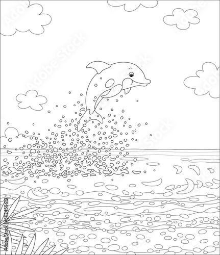 Merry playful little dolphin in splashes jumping out of water near a sandy beach of a palm island in a tropical sea, black and white vector cartoon illustration for a coloring book page photo