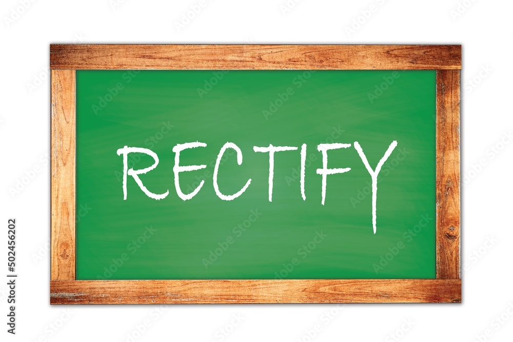 Fototapeta premium RECTIFY text written on green school board.