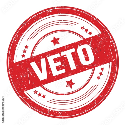 VETO text on red round grungy stamp. photo