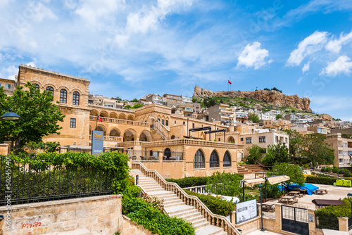 Mardin old town view with Mardin castle at the top,  cityscape of Mardin in Turkey photo