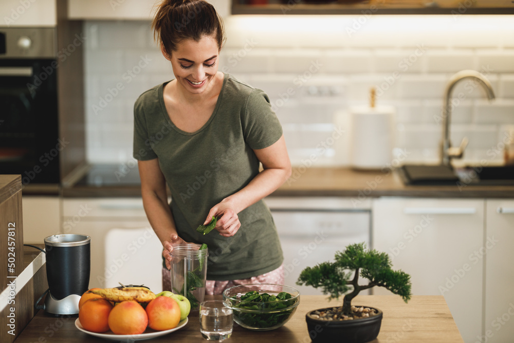 Woman Making A Healthy Smoothie At Home