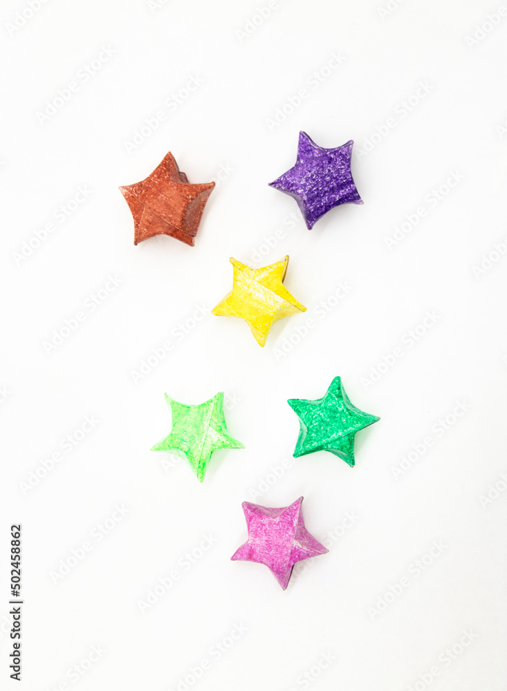paper made colorful star isolate on white background, top view paper made colorful star isolate on white background, top view