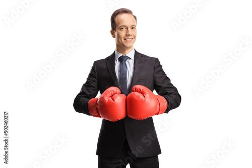 Portrait of a businessman with red boxing gloves