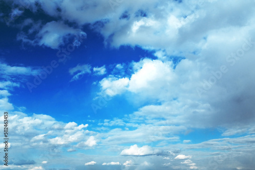 Rows of white clouds in spring and a bright blue sky