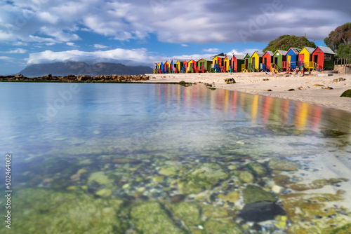 View of St James tidal pool and colourful huts, Cape Town, South Africa. photo