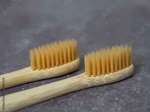 Natural bamboo toothbrushes close up. dental care  plastic free concept. Copy space for text
