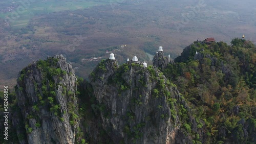 Aerial view of Wat Chaloem Phra Kiat Phrachomklao Rachanusorn, sky pagodas on top of mountain in Lampang Thailand photo