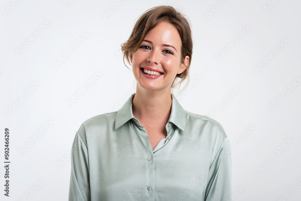 Happy woman studio portrait while standing at isolated background Happy woman studio portrait while standing at isolated background