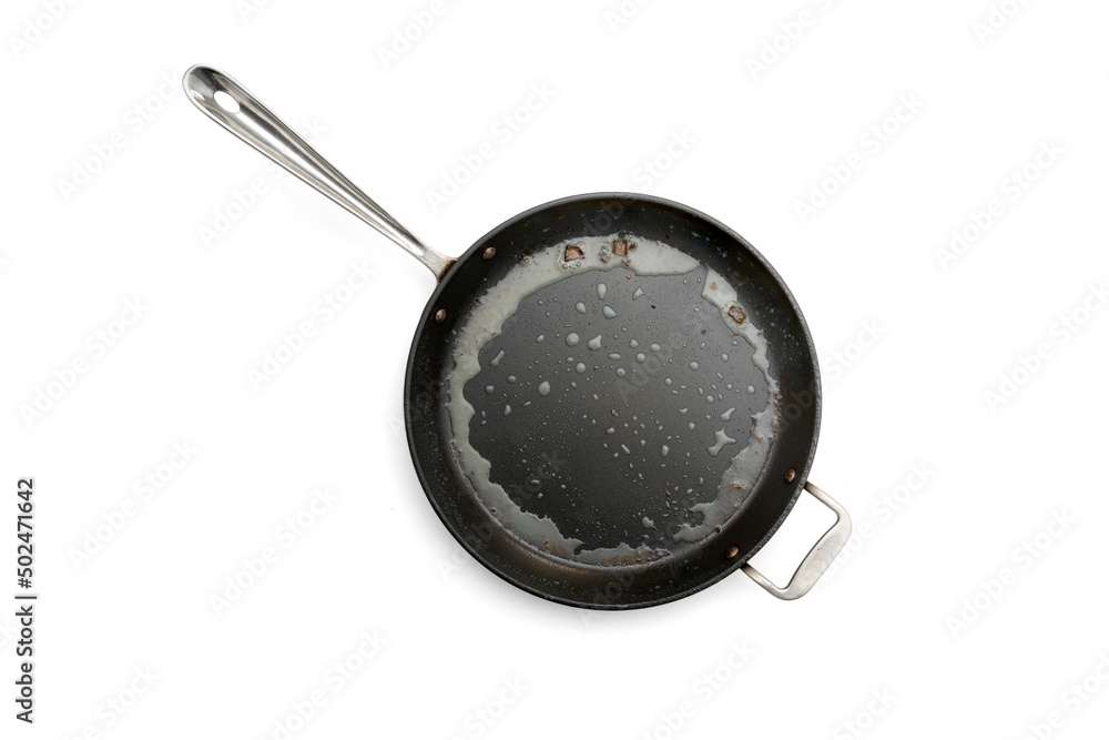 Greasy Household Non-Stick Frying Pan Dirty Isolated on white background Greasy Household Non-Stick Frying Pan Dirty Isolated on white background