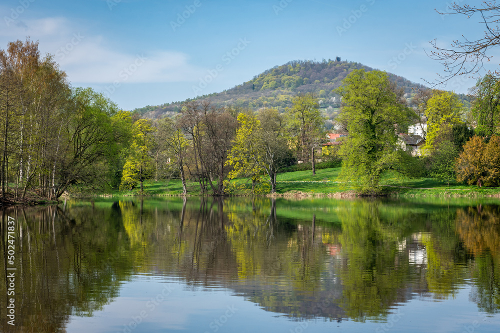 Springtime scenery of River Ohře with a view on the ruin of Šumburk castle on the top of the hill