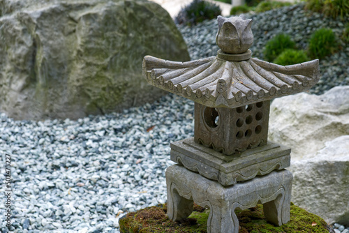 stone temple in a zen garden photo