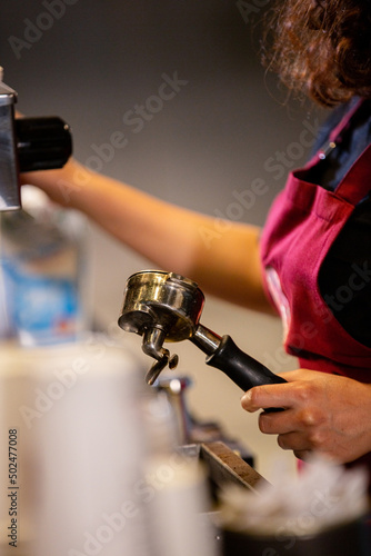 female barista working in cafe