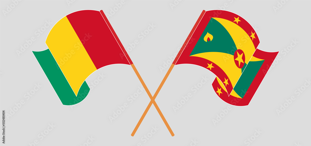Crossed and waving flags of Guinea and Grenada Crossed and waving flags of Guinea and Grenada