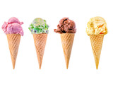 Row of Strawberry, Mint, Chocolate and Vanilla ice cream sugar cones on a white background with copy space.