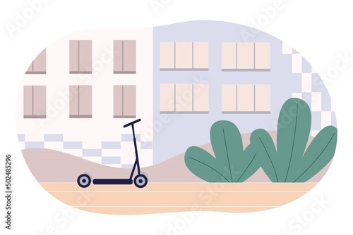 The concept of outdoor activities. An electric scooter stands on the street.