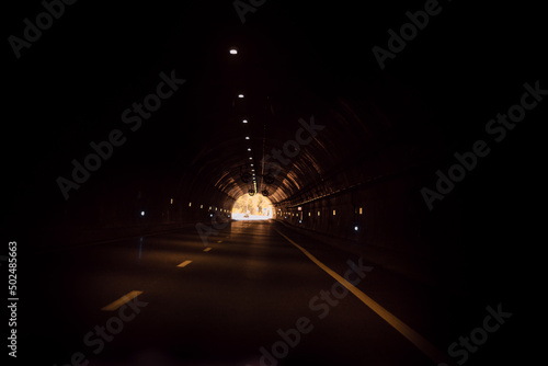 The Marão Tunnel is a road tunnel located in Portugal that connects Amarante with Vila Real, crossing the Serra do Marão. - Hope concept, the light at the end of the tunnel. photo