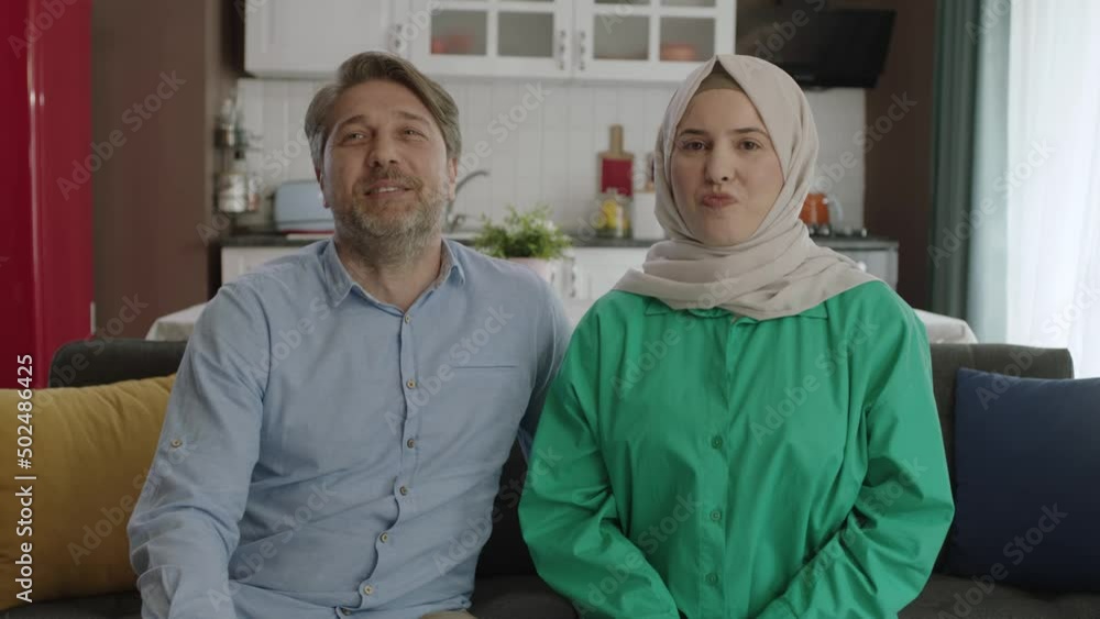 Portrait of excited new landlords, real estate and tenancy. Valentine's