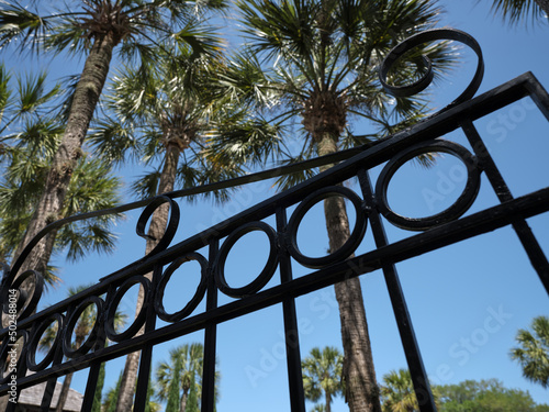 Obraz na plátně Iron gates protect the Queen Victoria gardens in old St Augustine Florida with s